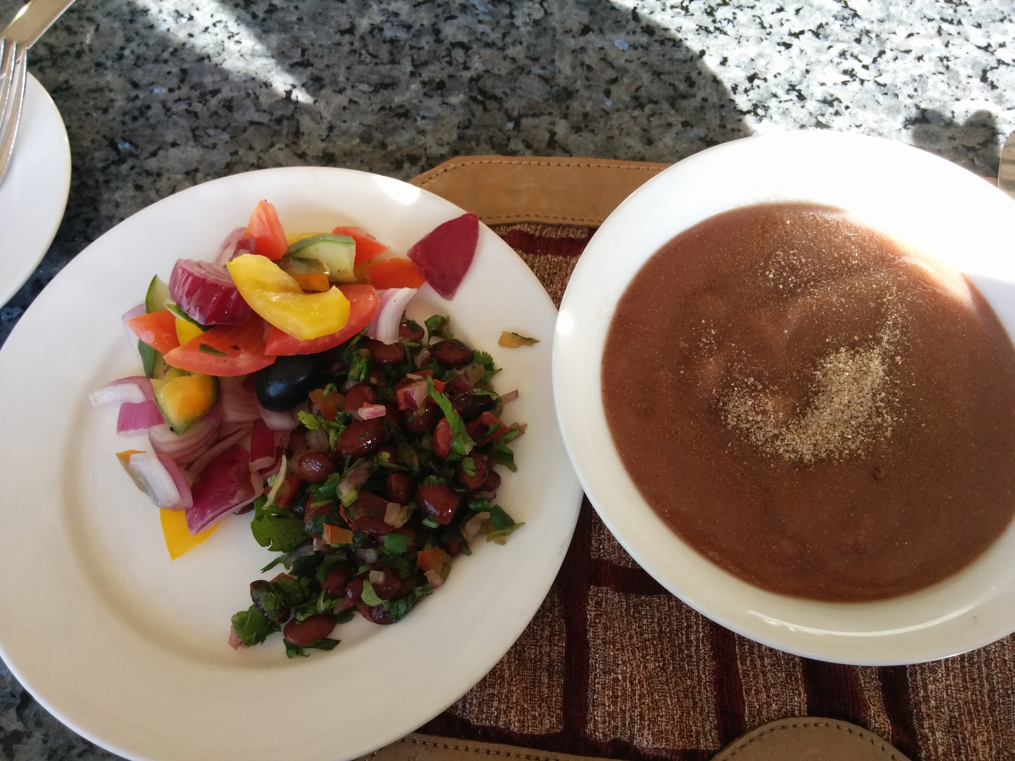 Ragi porridge with BrownSugar and a Kidney Bean salad with Vegetables