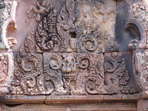 Likely depiction of Lord Murugan on his vehicle, peacocks