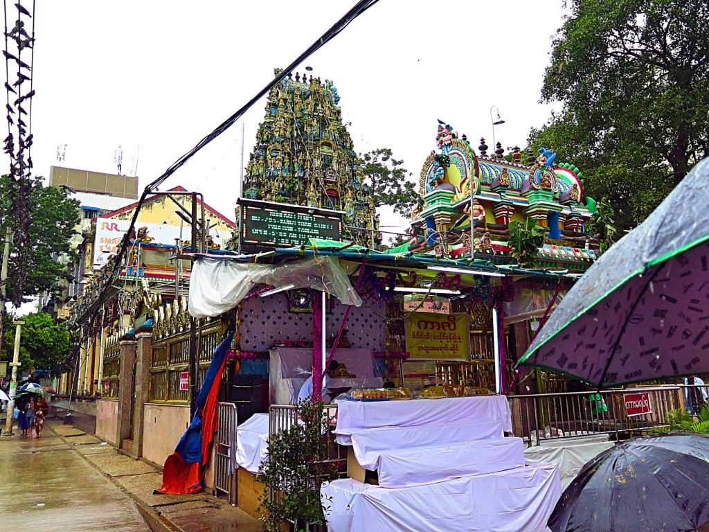 The Gopuram of Kali temple towers above the smaller gopuram near the entrance