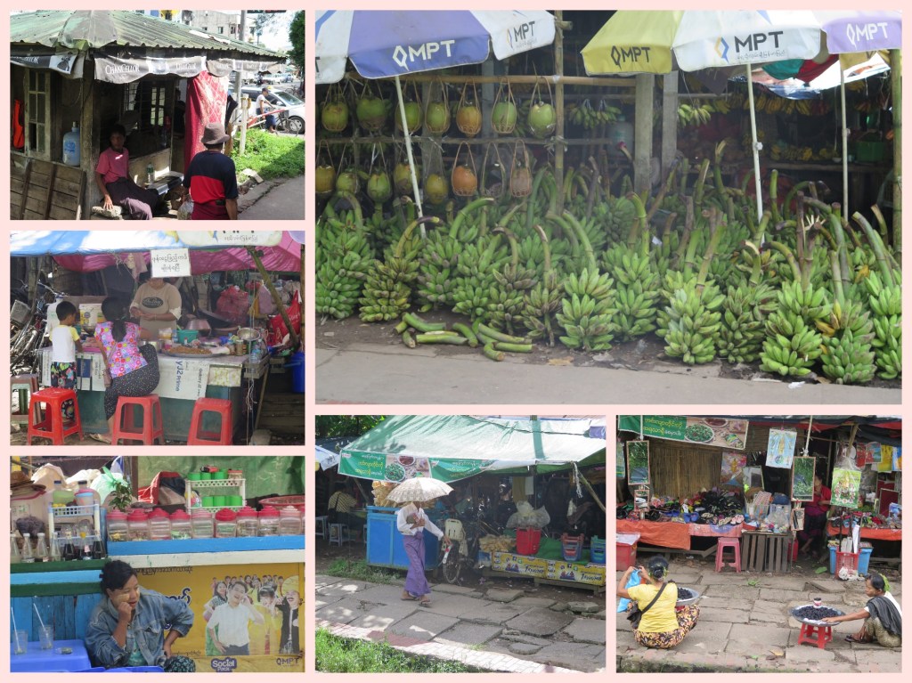 Bananas ready for ripening, shacks selling food items on platforms and alongside tracks
