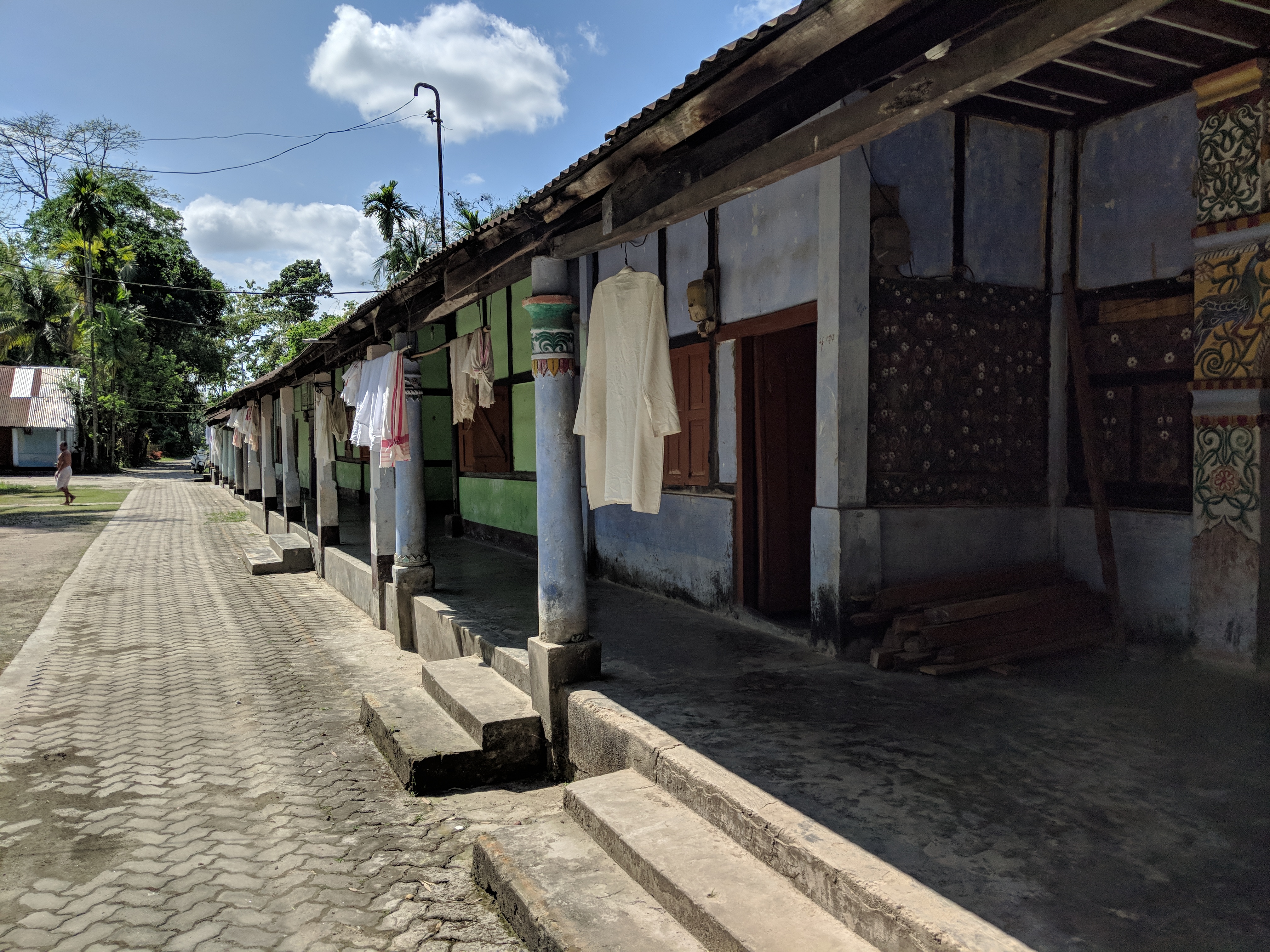 The residential quarters of the Uttar Kamalabari Satra. In this Satra both the Satradhikar and the Bhakats (disciples) spend their life in celibacy. The Bhagavad Gita is the central deity to whom prayers are held everyday.