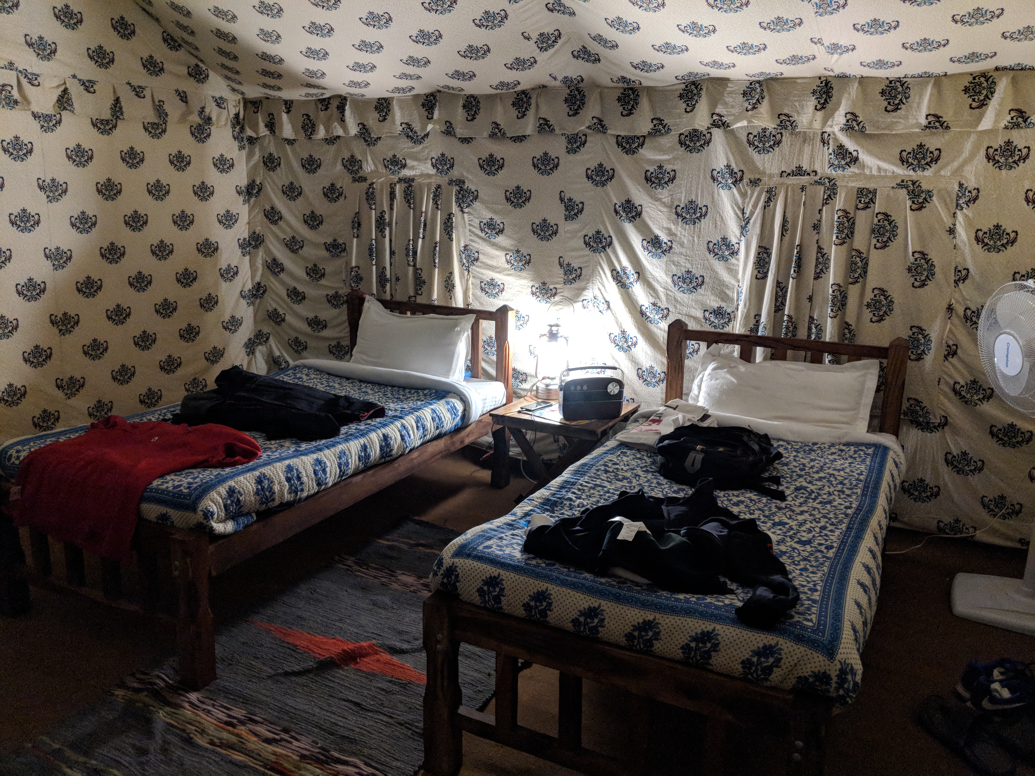 Two Beds, a Fan in the tent and a Caravan music player