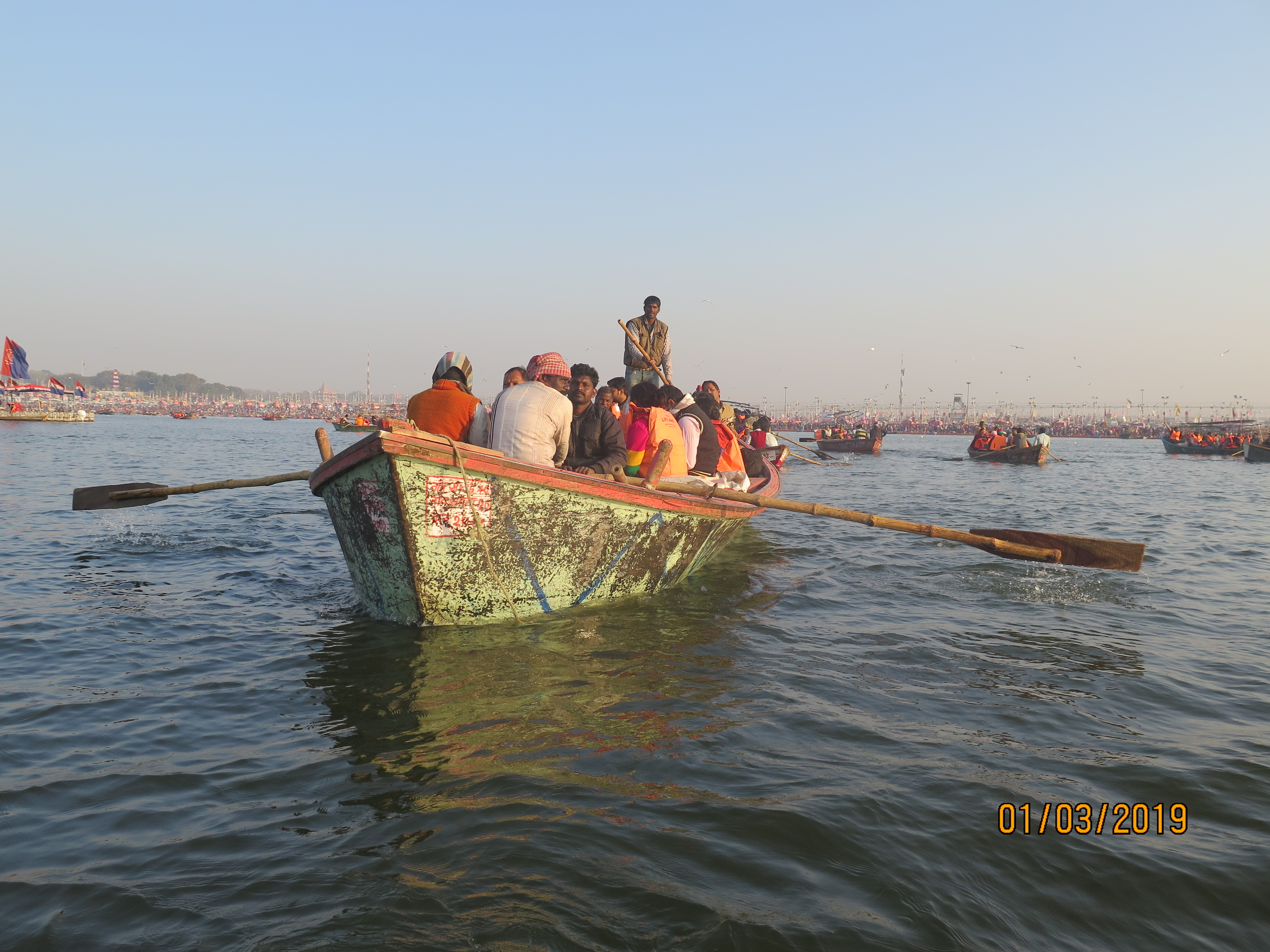 Passenger traffic on the Ganges transporting devotees and workers headed towards the Ghats.