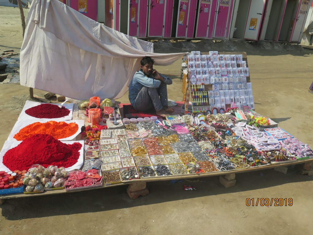 Vendor selling vermillion, personal effects and care items