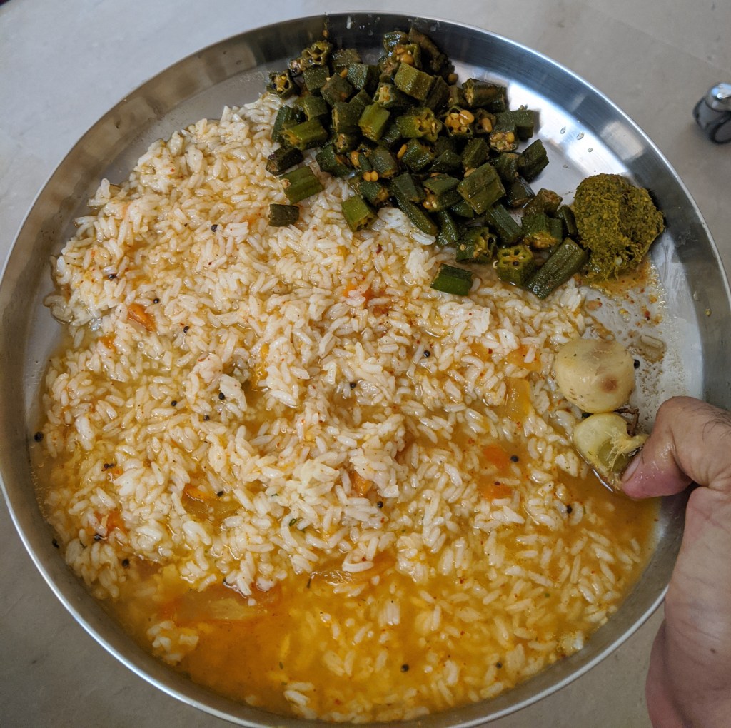 Poricha Rasam and rice, Bhindi subzi, Kothamalli (coriander) thuvayal along with steamed amla