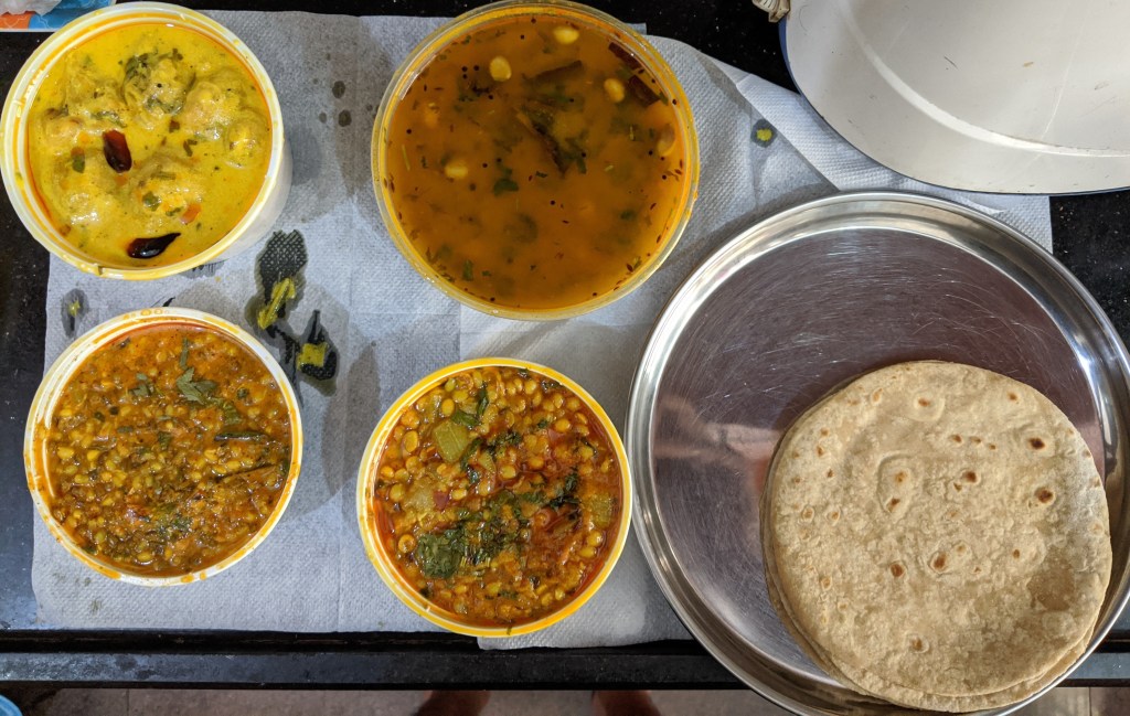 Dahiwala moong sabzi, Dudhi (bottlegourd) with chana subzi, Pakodi kadi and Gujarati dal with Rotis