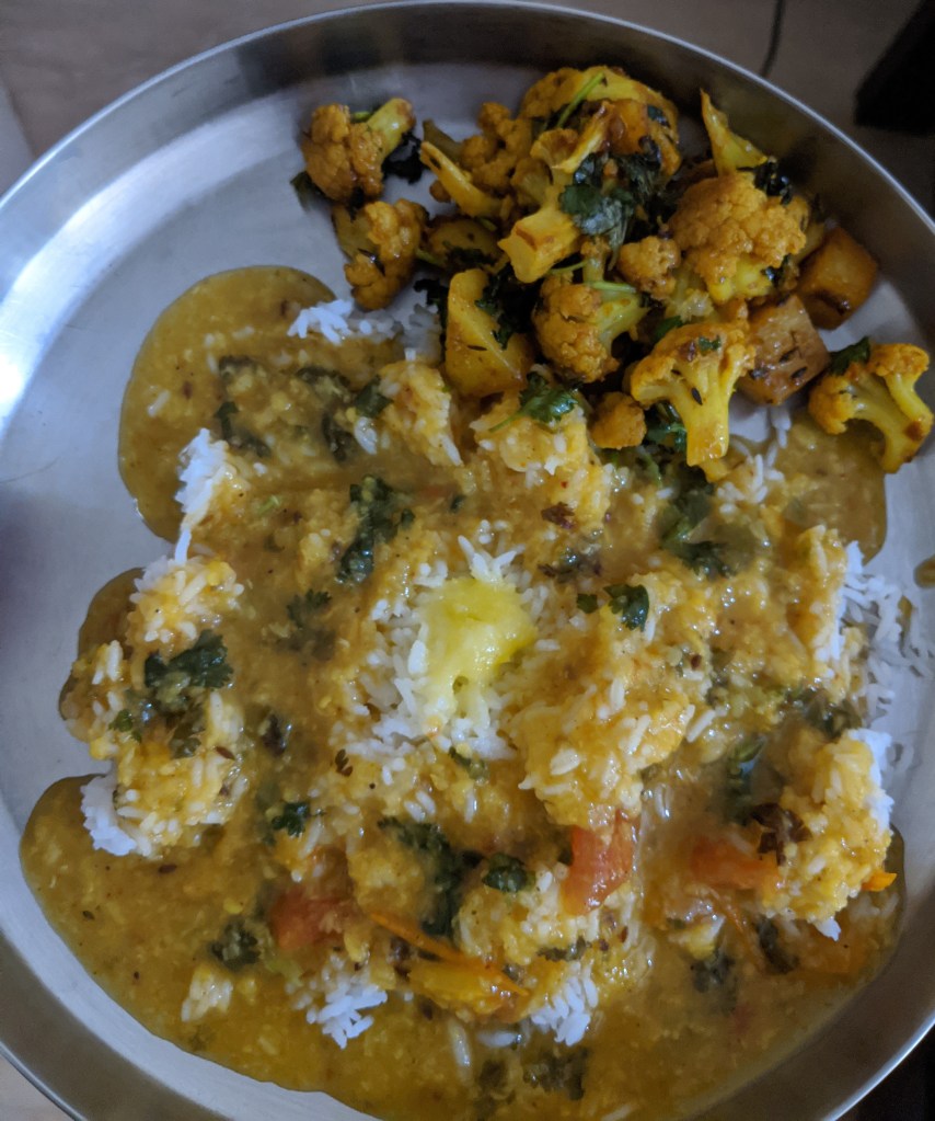 Dal rice and ghee with Cauliflower and potato subzi