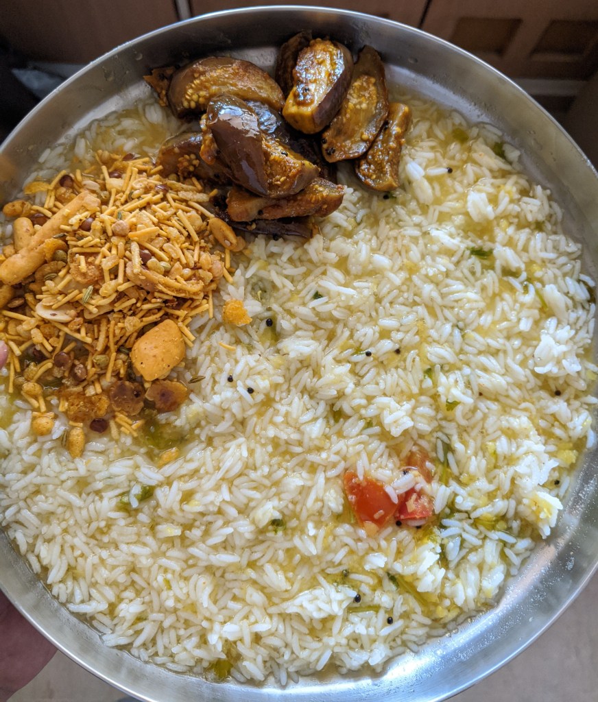 Lemon rasam with brinjal (eggplant) curry and some mixture